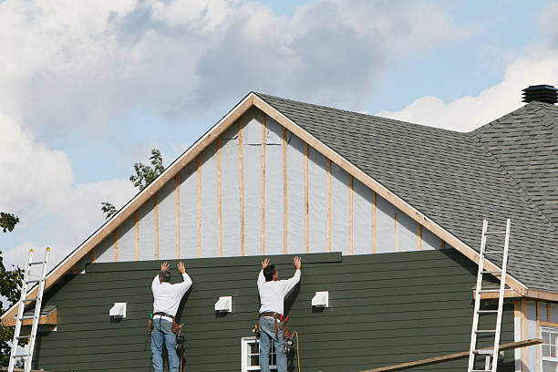 Professional Storm Damage Siding Repair technician working in Sebastian, FL
